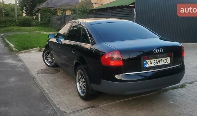 Черный Ауди А6, объемом двигателя 1.78 л и пробегом 370 тыс. км за 5300 $, фото 1 на Automoto.ua