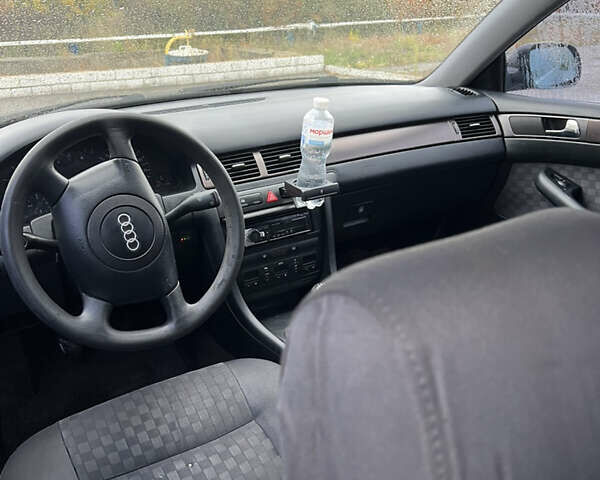 Ауді А6 1999 у Дніпро (Дніпропетровську) на Automoto.ua Чорний Ауді А6, об'ємом двигуна 2.39 л та пробігом 297 тис. км за 3999 $, фото 7 на Automoto.ua
