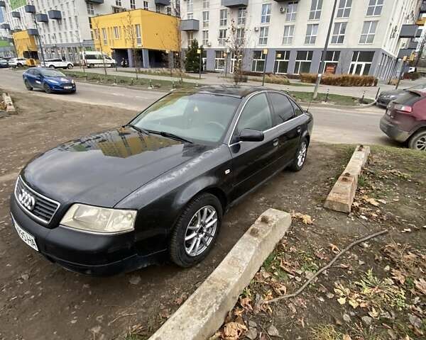 Черный Ауди А6, объемом двигателя 2.5 л и пробегом 300 тыс. км за 3000 $, фото 2 на Automoto.ua