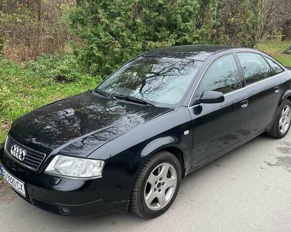 Черный Ауди А6, объемом двигателя 2.4 л и пробегом 337 тыс. км за 3700 $, фото 1 на Automoto.ua