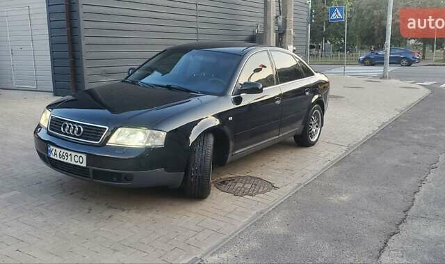 Черный Ауди А6, объемом двигателя 1.78 л и пробегом 370 тыс. км за 5300 $, фото 2 на Automoto.ua