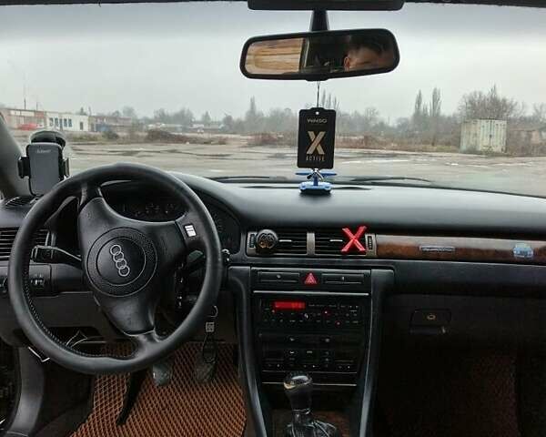 Черный Ауди А6, объемом двигателя 1.9 л и пробегом 256 тыс. км за 3800 $, фото 1 на Automoto.ua