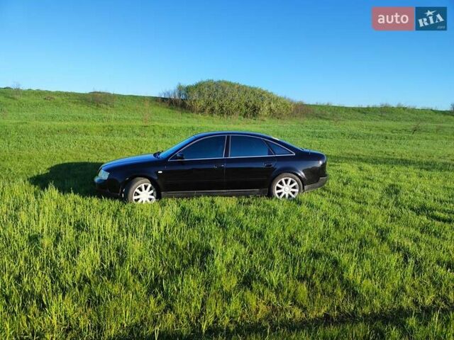 Черный Ауди А6, объемом двигателя 1.8 л и пробегом 350 тыс. км за 5200 $, фото 7 на Automoto.ua