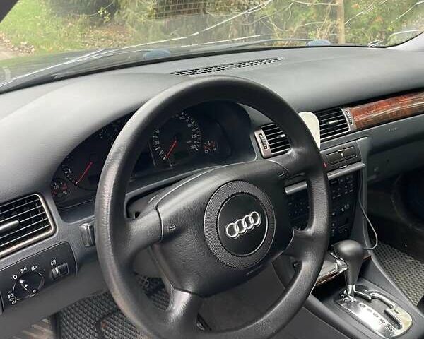 Черный Ауди А6, объемом двигателя 2.4 л и пробегом 337 тыс. км за 3700 $, фото 11 на Automoto.ua