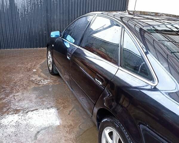 Черный Ауди А6, объемом двигателя 1.8 л и пробегом 300 тыс. км за 4800 $, фото 2 на Automoto.ua