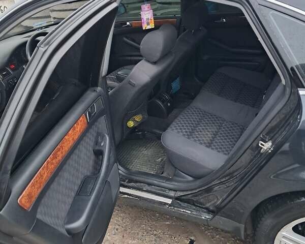 Черный Ауди А6, объемом двигателя 2.4 л и пробегом 430 тыс. км за 4500 $, фото 5 на Automoto.ua