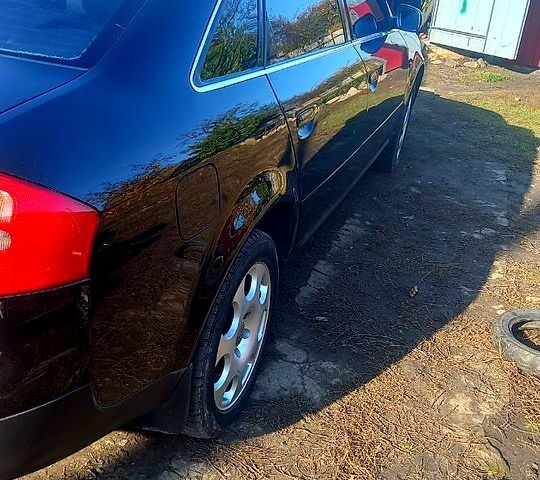 Черный Ауди А6, объемом двигателя 1.8 л и пробегом 300 тыс. км за 4500 $, фото 2 на Automoto.ua