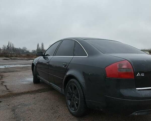 Черный Ауди А6, объемом двигателя 1.9 л и пробегом 256 тыс. км за 3800 $, фото 2 на Automoto.ua