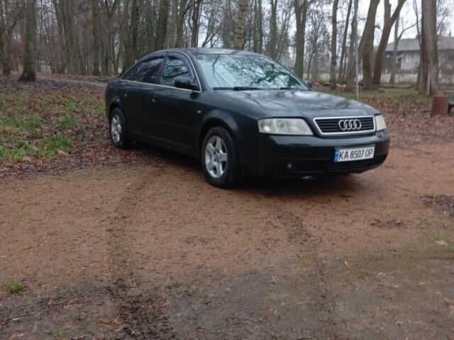 Чорний Ауді А6, об'ємом двигуна 1.8 л та пробігом 294 тис. км за 3300 $, фото 1 на Automoto.ua