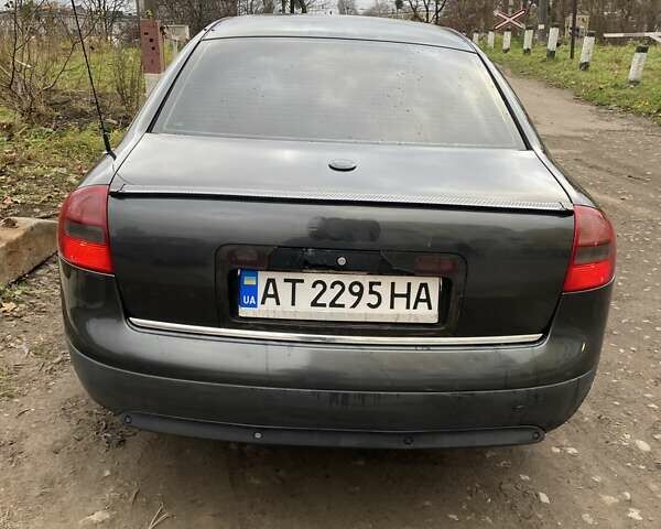 Черный Ауди А6, объемом двигателя 2.5 л и пробегом 300 тыс. км за 3000 $, фото 1 на Automoto.ua