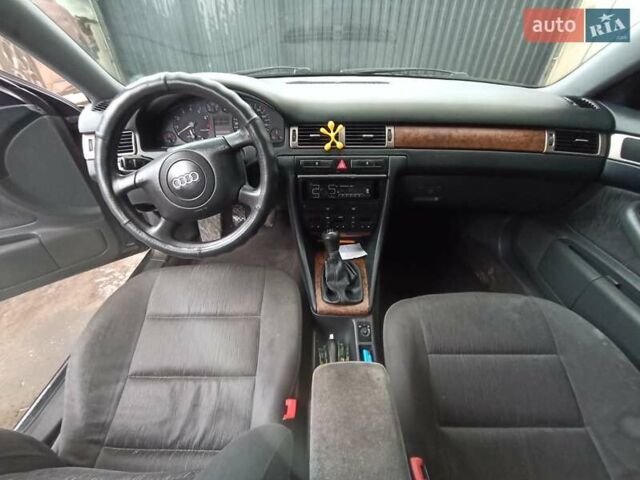 Черный Ауди А6, объемом двигателя 1.8 л и пробегом 300 тыс. км за 4800 $, фото 9 на Automoto.ua