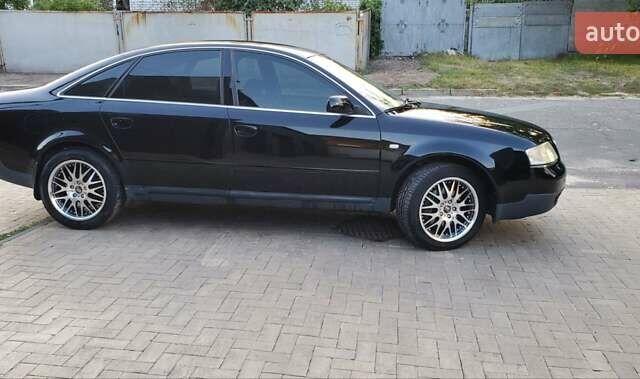 Черный Ауди А6, объемом двигателя 1.78 л и пробегом 370 тыс. км за 5300 $, фото 6 на Automoto.ua