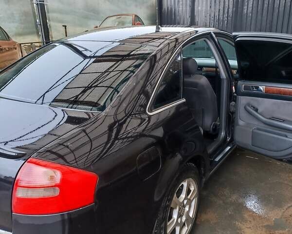 Черный Ауди А6, объемом двигателя 1.8 л и пробегом 300 тыс. км за 4800 $, фото 12 на Automoto.ua