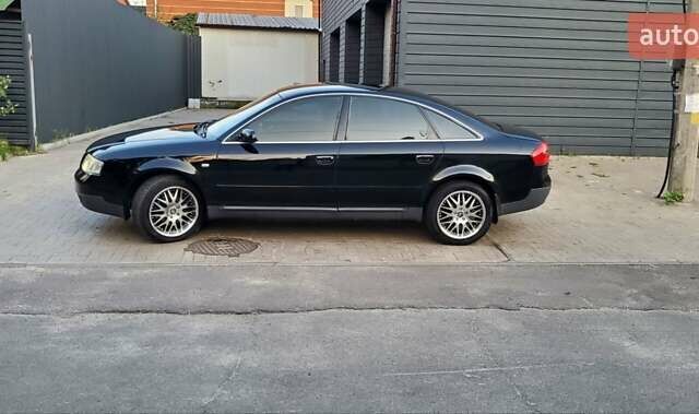 Черный Ауди А6, объемом двигателя 1.78 л и пробегом 370 тыс. км за 5300 $, фото 3 на Automoto.ua