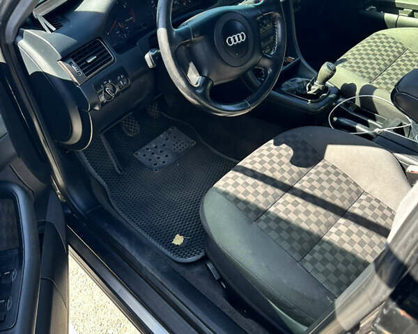 Черный Ауди А6, объемом двигателя 1.8 л и пробегом 320 тыс. км за 5200 $, фото 3 на Automoto.ua