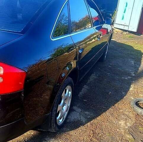 Черный Ауди А6, объемом двигателя 1.8 л и пробегом 300 тыс. км за 4500 $, фото 1 на Automoto.ua