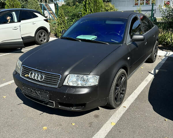 Черный Ауди А6, объемом двигателя 1.8 л и пробегом 320 тыс. км за 5200 $, фото 2 на Automoto.ua