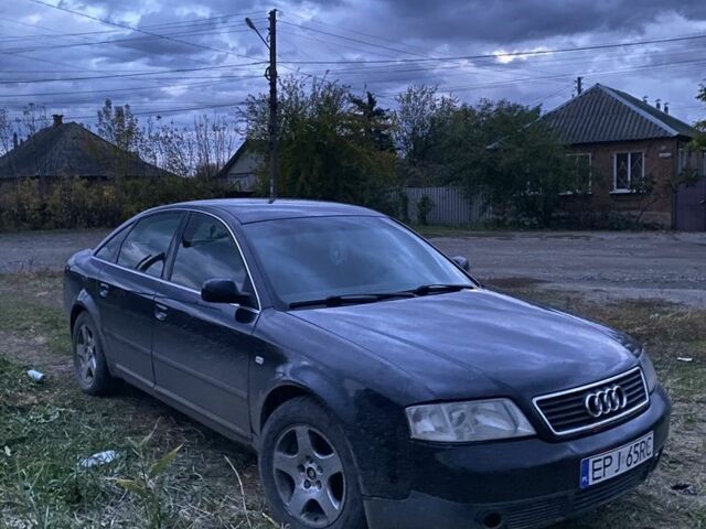 Черный Ауди А6, объемом двигателя 2.5 л и пробегом 310 тыс. км за 1300 $, фото 1 на Automoto.ua