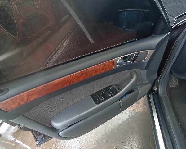 Черный Ауди А6, объемом двигателя 1.8 л и пробегом 300 тыс. км за 4800 $, фото 8 на Automoto.ua