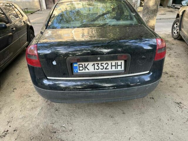 Черный Ауди А6, объемом двигателя 2.5 л и пробегом 455 тыс. км за 2200 $, фото 1 на Automoto.ua