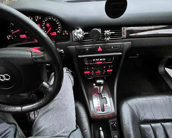 Черный Ауди А6, объемом двигателя 2.5 л и пробегом 325 тыс. км за 4200 $, фото 2 на Automoto.ua