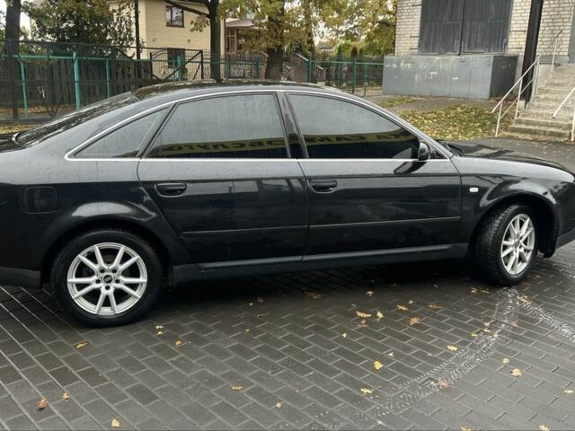 Черный Ауди А6, объемом двигателя 2.5 л и пробегом 328 тыс. км за 4100 $, фото 5 на Automoto.ua