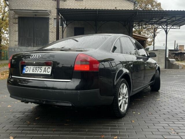 Черный Ауди А6, объемом двигателя 2.5 л и пробегом 328 тыс. км за 4100 $, фото 4 на Automoto.ua