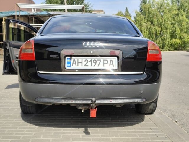 Черный Ауди А6, объемом двигателя 2.5 л и пробегом 380 тыс. км за 4000 $, фото 1 на Automoto.ua