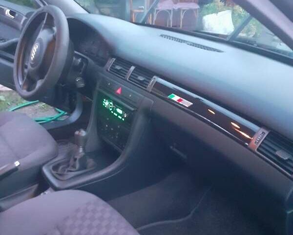 Чорний Ауді А6, об'ємом двигуна 1.8 л та пробігом 218 тис. км за 5500 $, фото 2 на Automoto.ua