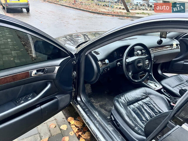 Черный Ауди А6, объемом двигателя 2.5 л и пробегом 325 тыс. км за 4200 $, фото 4 на Automoto.ua