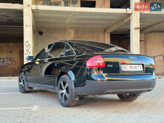 Черный Ауди А6, объемом двигателя 2.4 л и пробегом 290 тыс. км за 5500 $, фото 13 на Automoto.ua