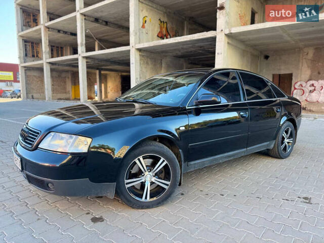 Черный Ауди А6, объемом двигателя 2.4 л и пробегом 290 тыс. км за 5500 $, фото 1 на Automoto.ua