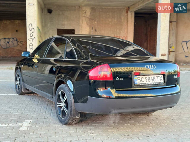 Черный Ауди А6, объемом двигателя 2.4 л и пробегом 290 тыс. км за 5500 $, фото 11 на Automoto.ua