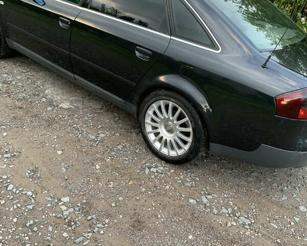 Черный Ауди А6, объемом двигателя 2.5 л и пробегом 326 тыс. км за 3700 $, фото 5 на Automoto.ua