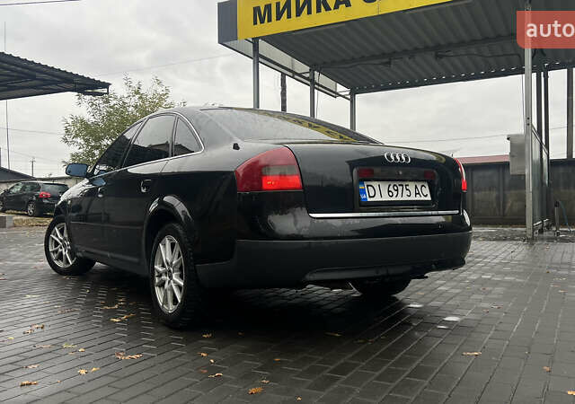Черный Ауди А6, объемом двигателя 2.5 л и пробегом 328 тыс. км за 4100 $, фото 14 на Automoto.ua