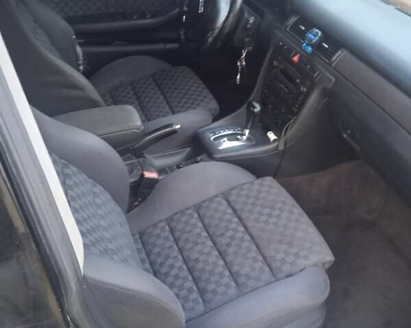 Черный Ауди А6, объемом двигателя 2.5 л и пробегом 349 тыс. км за 1900 $, фото 2 на Automoto.ua