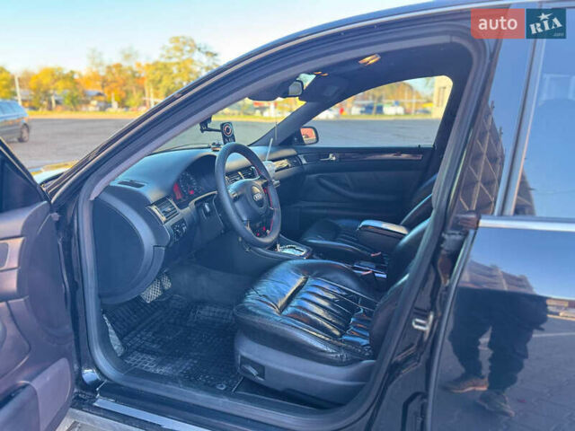 Черный Ауди А6, объемом двигателя 2.4 л и пробегом 290 тыс. км за 5500 $, фото 24 на Automoto.ua