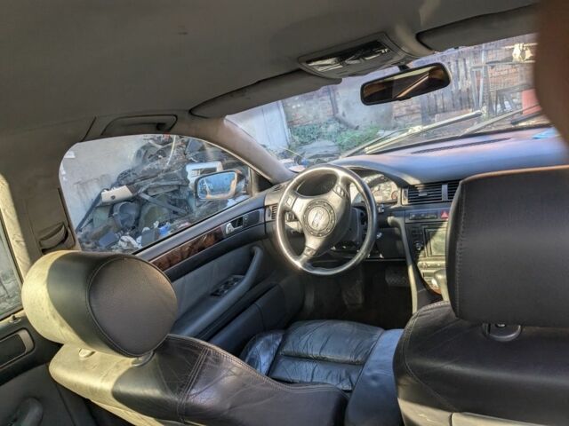 Черный Ауди А6, объемом двигателя 2 л и пробегом 200 тыс. км за 2500 $, фото 6 на Automoto.ua