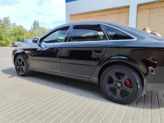 Черный Ауди А6, объемом двигателя 2.5 л и пробегом 380 тыс. км за 4000 $, фото 4 на Automoto.ua