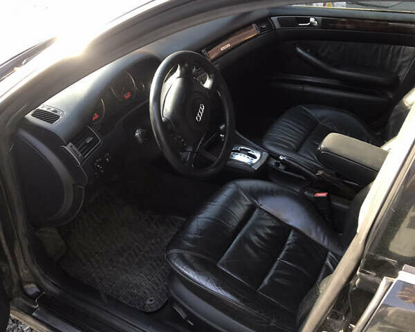 Черный Ауди А6, объемом двигателя 2.39 л и пробегом 357 тыс. км за 4000 $, фото 3 на Automoto.ua