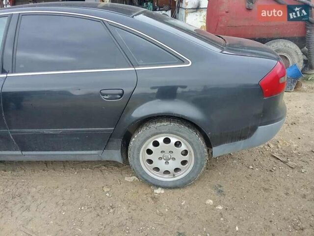 Черный Ауди А6, объемом двигателя 2.5 л и пробегом 289 тыс. км за 2999 $, фото 2 на Automoto.ua