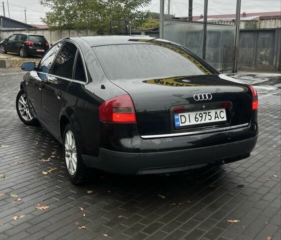 Черный Ауди А6, объемом двигателя 2.5 л и пробегом 328 тыс. км за 4100 $, фото 3 на Automoto.ua