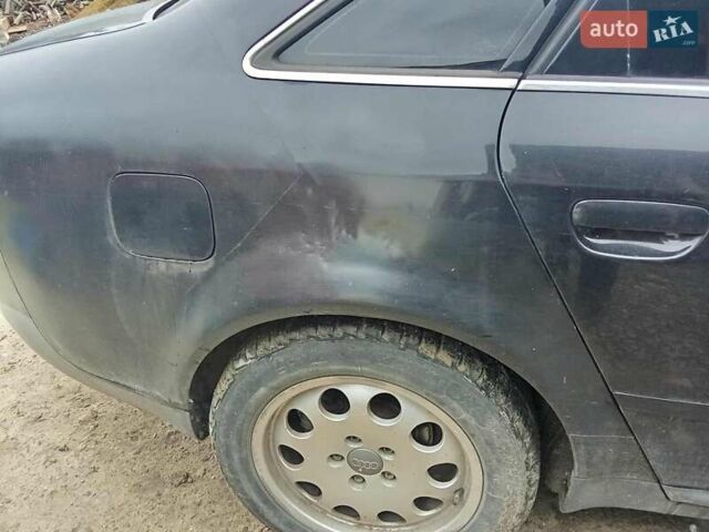 Черный Ауди А6, объемом двигателя 2.5 л и пробегом 289 тыс. км за 2999 $, фото 1 на Automoto.ua