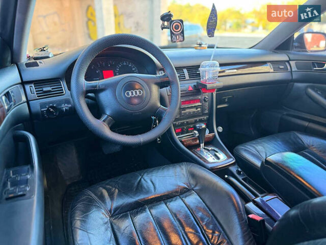 Черный Ауди А6, объемом двигателя 2.4 л и пробегом 290 тыс. км за 5500 $, фото 23 на Automoto.ua