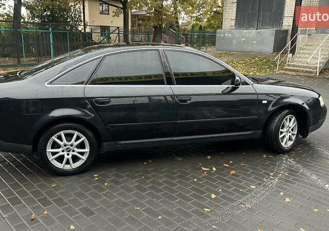 Черный Ауди А6, объемом двигателя 2.5 л и пробегом 328 тыс. км за 4100 $, фото 11 на Automoto.ua