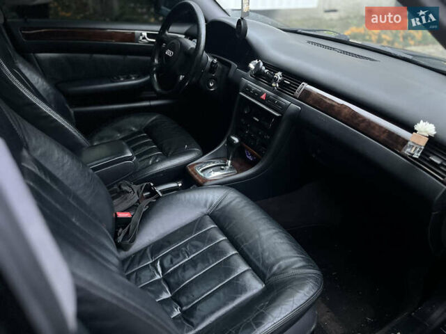 Черный Ауди А6, объемом двигателя 2.5 л и пробегом 325 тыс. км за 4200 $, фото 6 на Automoto.ua