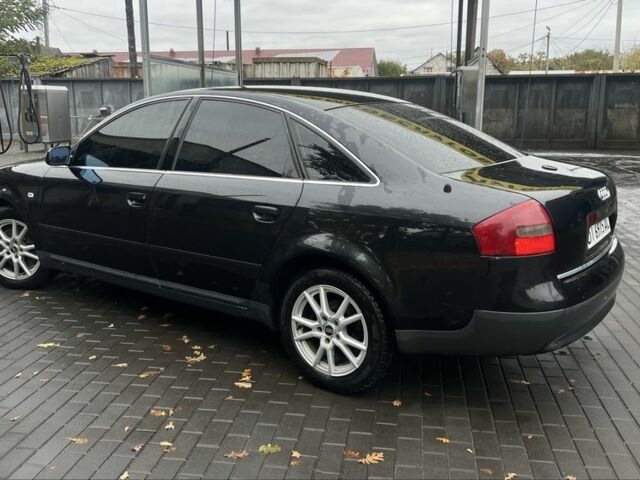 Черный Ауди А6, объемом двигателя 2.5 л и пробегом 328 тыс. км за 4100 $, фото 2 на Automoto.ua