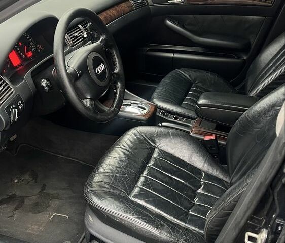 Черный Ауди А6, объемом двигателя 2.5 л и пробегом 328 тыс. км за 4100 $, фото 6 на Automoto.ua