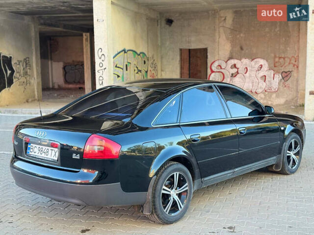 Черный Ауди А6, объемом двигателя 2.4 л и пробегом 290 тыс. км за 5500 $, фото 18 на Automoto.ua