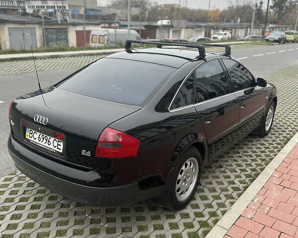 Черный Ауди А6, объемом двигателя 2.4 л и пробегом 285 тыс. км за 5900 $, фото 3 на Automoto.ua